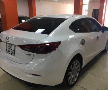 Mazda 3 2.0 AT 2015 - Bán Mazda 3 2.0 AT đời 2015, màu trắng, 660 triệu