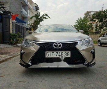 Toyota Camry 2016 - Bán Toyota Camry 2016, màu vàng cát