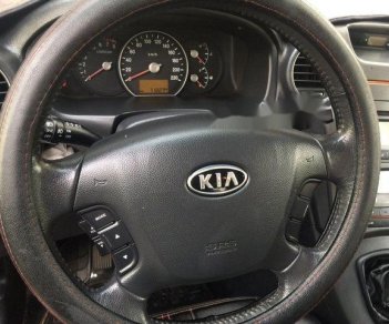 Kia Carens   2010 - Bán Kia Carens đời 2010, màu xám   