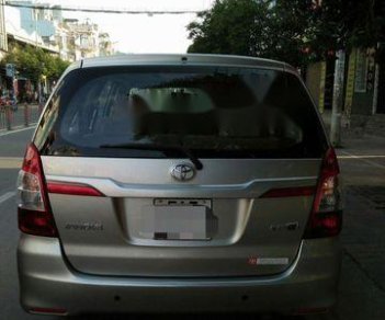 Toyota Innova 2014 - Cần bán lại xe Toyota Innova đời 2014, màu bạc chính chủ, giá 560tr