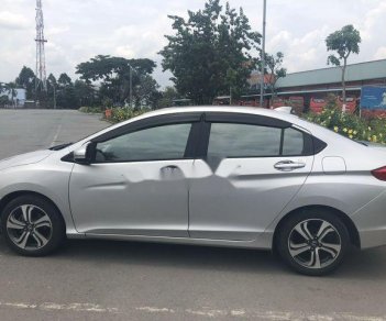 Honda City AT 2015 - Cần bán xe Honda City sản xuất năm 2015, màu bạc còn mới giá tốt