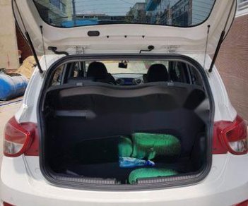 Hyundai Grand i10  1.2 AT 2015 - Cần bán Hyundai Grand i10 1.2 AT sản xuất năm 2015, màu trắng mới chạy 18.000 km giá cạnh tranh