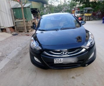 Hyundai i30 1.6 AT 2013 - Cần bán lại xe Hyundai i30 sản xuất 2013, màu đen, xe nhập, 525tr