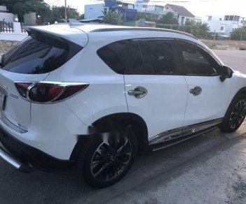 Mazda CX 5 2.0 2016 - Bán Mazda CX 5 2.0 đời 2016, màu trắng như mới, giá chỉ 830 triệu