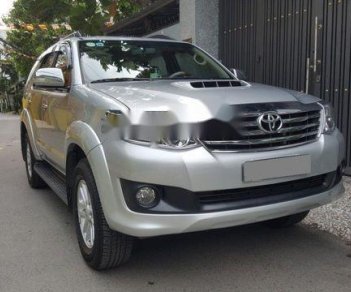 Toyota Fortuner   G  2014 - Cần bán gấp Toyota Fortuner G đời 2014, màu bạc xe gia đình giá tốt