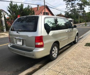 Kia Carnival 2.5AT  2009 - Chính chủ bán xe Kia Carnival 2.5AT đời 2009, màu bạc 