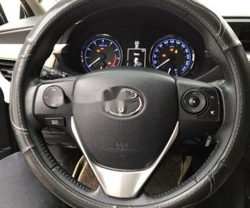 Toyota Corolla altis 1.8 2016 - Bán Toyota Corolla Altis 1.8 năm sản xuất 2016, màu đen, giá 715tr