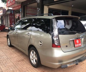 Mitsubishi Grandis 2.4 AT 2006 - Bán Mitsubishi Grandis 2.4 AT đời 2006, màu vàng, giá 375tr