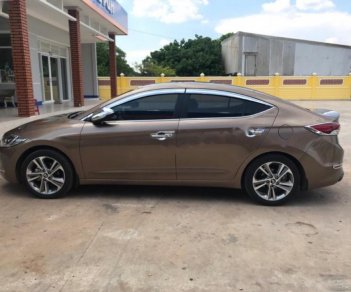 Hyundai Elantra 2.0 AT 2016 - Cần bán gấp Hyundai Elantra 2.0 AT đời 2016, màu nâu  