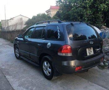 Hyundai Santa Fe 2005 - Bán ô tô Hyundai Santa Fe sản xuất 2005, màu đen, giá 275tr