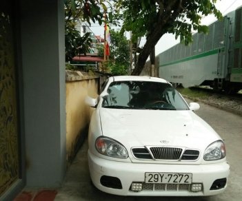 Daewoo Lanos SX 2001 - Cần bán Daewoo Lanos SX năm sản xuất 2001, màu trắng xe gia đình, 58 triệu