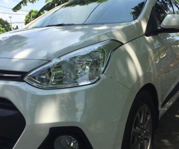 Hyundai Grand i10 1.2 AT 2016 - Bán xe Hyundai Grand i10 1.2 AT đời 2016, màu trắng, xe nhập đẹp như mới, 412 triệu