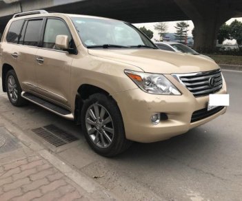 Lexus LX 570 2009 - Cần bán xe Lexus LX 570 sản xuất năm 2009, màu vàng, xe nhập