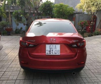 Mazda 2 2015 - Cần bán gấp Mazda 2 năm sản xuất 2015, màu đỏ, giá tốt
