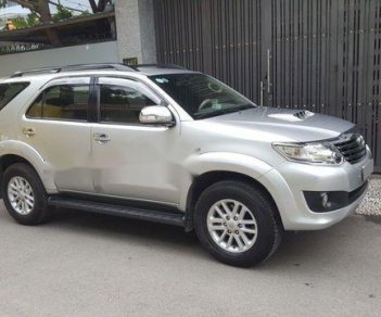 Toyota Fortuner   G  2014 - Cần bán gấp Toyota Fortuner G đời 2014, màu bạc xe gia đình giá tốt