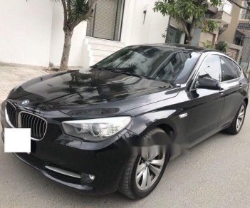 BMW 5 Series  535i GT  2011 - Cần bán lại xe BMW 5 Series 535i GT năm 2011, màu đen xe gia đình