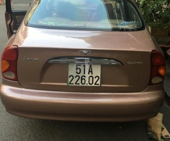 Daewoo Lanos 2002 - Bán rất gấp em Lanos đời 2002, màu nâu