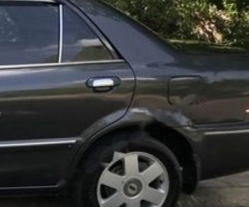 Ford Laser Delu 1.6 MT 2002 - Cần bán xe Ford Laser Delu 1.6 MT sản xuất năm 2002, màu xám  