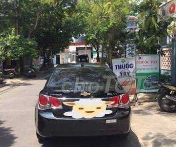 Chevrolet Cruze   2010 - Bán Chevrolet Cruze đời 2010, màu đen xe gia đình, giá 300tr