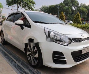 Kia Rio 1.4 AT 2015 - Cần bán xe Kia Rio 1.4 AT đời 2015, màu trắng, giá 536tr