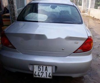 Kia Spectra 2004 - Cần bán xe Kia Spectra sản xuất 2004, màu bạc