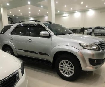 Toyota Fortuner 2014 - Cần bán lại xe Toyota Fortuner năm sản xuất 2014, màu bạc số tự động