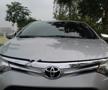 Toyota Vios 1.3J 2014 - Cần bán xe Toyota Vios J 2014, màu bạc