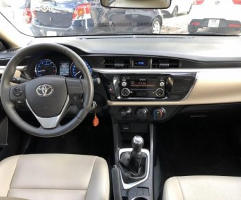 Toyota Corolla altis 1.8G MT 2014 - Cần bán xe Toyota Corolla Altis 1.8G MT sản xuất năm 2014, màu đen giá cạnh tranh