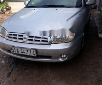 Kia Spectra 2004 - Cần bán xe Kia Spectra sản xuất 2004, màu bạc