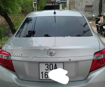 Toyota Vios 1.3J 2014 - Cần bán xe Toyota Vios J 2014, màu bạc