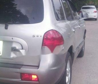 Hyundai Santa Fe  Gold 2005 - Cần bán lại xe Hyundai Santa Fe Gold sản xuất 2005, màu bạc như mới