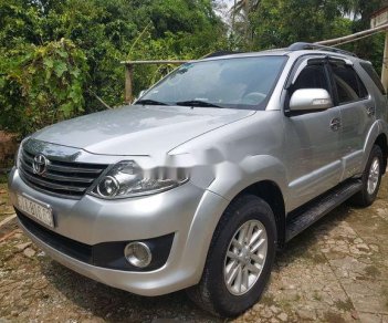 Toyota Fortuner   2014 - Bán Toyota Fortuner năm 2014, màu bạc chính chủ, giá 750tr