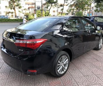 Toyota Corolla altis 1.8G MT 2014 - Cần bán xe Toyota Corolla Altis 1.8G MT sản xuất năm 2014, màu đen giá cạnh tranh