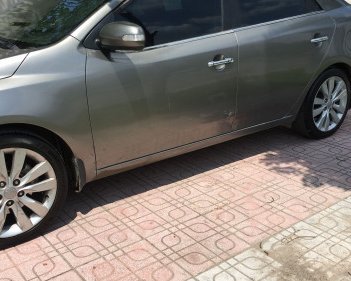 Kia Cerato  1.6L AT  2010 - Bán xe Kia Cerato 1.6L AT 2010, màu xám, xe nhập 