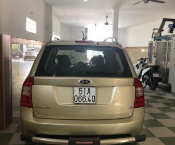 Kia Carens SXAT 2011 - Cần bán lại xe Kia Carens SXAT sản xuất 2011, màu vàng, 360tr