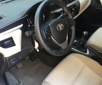 Toyota Corolla altis 1.8G MT 2016 - Cần bán Toyota Corolla altis 1.8G MT đời 2016, màu nâu  
