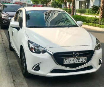 Mazda 2 2016 - Bán xe Mazda 2 2016, màu trắng còn mới