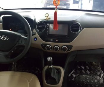 Hyundai Grand i10  1.2MT  2016 - Bán Hyundai i10 sedan 1.2MT full năm sản xuất 2016, màu trắng, nhập khẩu, giá chỉ 375 triệu