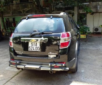 Chevrolet Captiva LT 2.4 MT 2009 - Cần bán gấp Chevrolet Captiva LT 2.4 MT năm 2009, màu đen