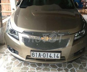 Chevrolet Cruze 2011 - Bán Chevrolet Cruze sản xuất năm 2011, màu vàng cát