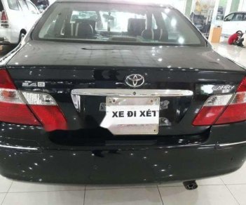 Toyota Camry MT 2002 - Bán Toyota Camry MT 2002, màu đen