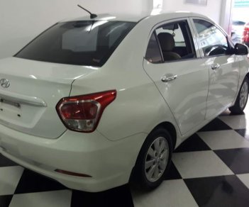 Hyundai Grand i10  1.2MT  2016 - Bán Hyundai i10 sedan 1.2MT full năm sản xuất 2016, màu trắng, nhập khẩu, giá chỉ 375 triệu