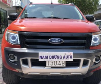 Ford Ranger Wildtrak 2.2AT 2014 - Bán xe Ford Ranger Wildtrak 2.2AT đời 2014 màu cam, giá tốt, nhập khẩu nguyên chiếc