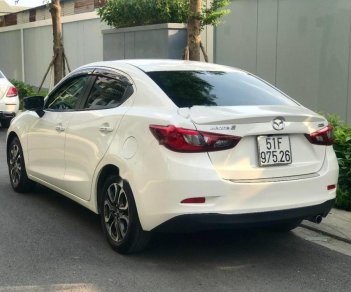 Mazda 2 2016 - Bán xe Mazda 2 2016, màu trắng còn mới