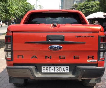 Ford Ranger Wildtrak 2.2AT 2014 - Bán xe Ford Ranger Wildtrak 2.2AT đời 2014 màu cam, giá tốt, nhập khẩu nguyên chiếc