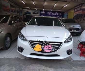 Mazda 3 1.5 AT 2015 - Cần bán xe Mazda 3 1.5AT năm 2015, màu trắng, 595 triệu