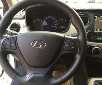 Hyundai Grand i10 2015 - Cần bán Hyundai Grand i10 đời 2015, màu trắng số sàn, giá 318tr