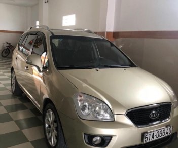 Kia Carens SXAT 2011 - Cần bán lại xe Kia Carens SXAT sản xuất 2011, màu vàng, 360tr