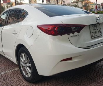 Mazda 3 1.5 AT 2016 - Cần bán lại xe Mazda 3 1.5 AT năm sản xuất 2016, màu trắng chính chủ