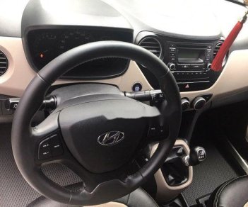 Hyundai Grand i10 2015 - Cần bán Hyundai Grand i10 đời 2015, màu trắng số sàn, giá 318tr